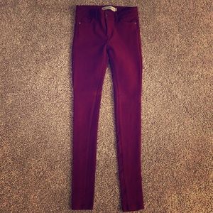 Burgundy stretch skinny jeans